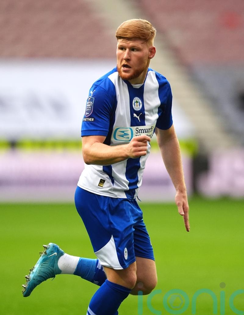 York ease past Brackley to keep pace with National League leaders Rochdale